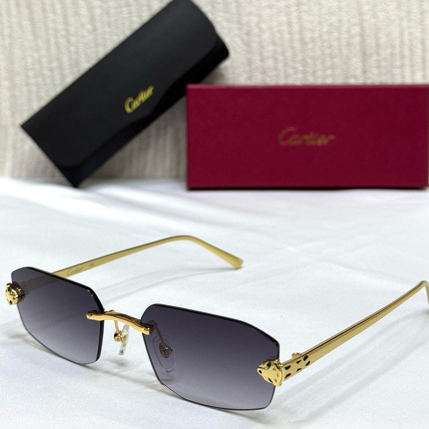 Cartier CT0323S Panthère Rimless Sunglasses - Sassygrove