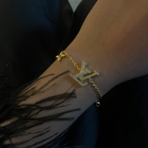 6C2239F4-B8C0-47C1-9880-76FD5FD32255 Designer lvee bling bracelet - Sassygrove